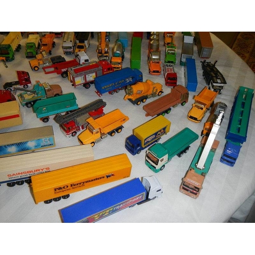 299 - In excess of 60 cars and lorries, die cast and plastic.