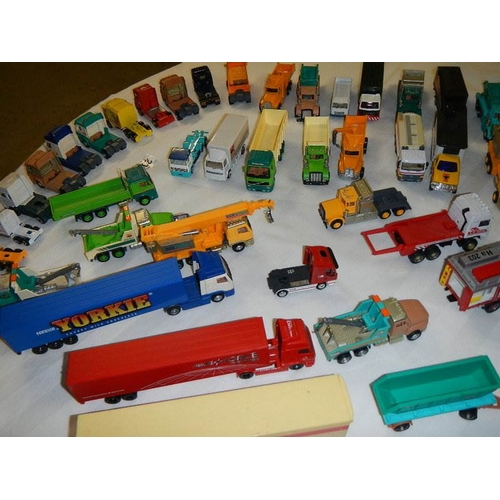 299 - In excess of 60 cars and lorries, die cast and plastic.