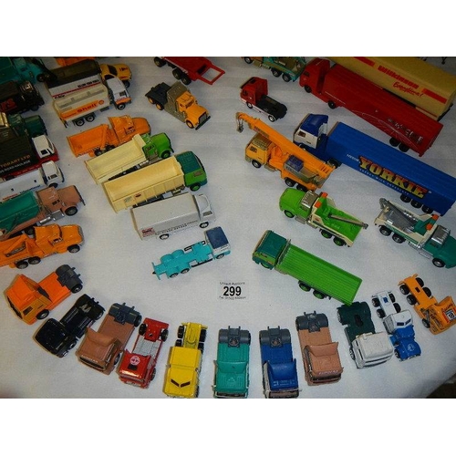 299 - In excess of 60 cars and lorries, die cast and plastic.