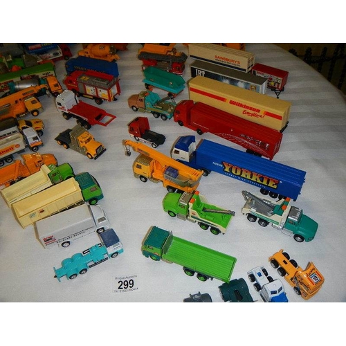 299 - In excess of 60 cars and lorries, die cast and plastic.