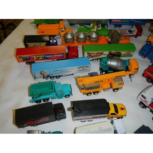 299 - In excess of 60 cars and lorries, die cast and plastic.