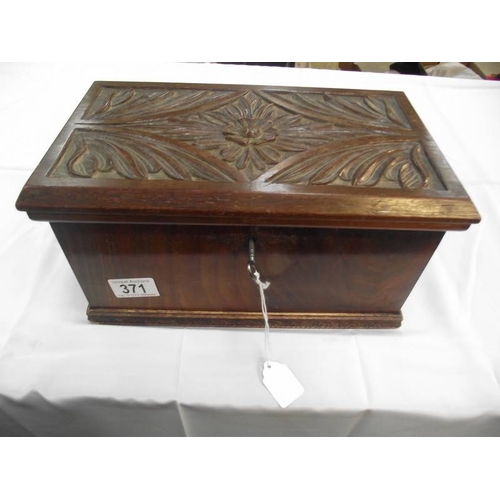 371 - A good carved wood box with key (does not lock)