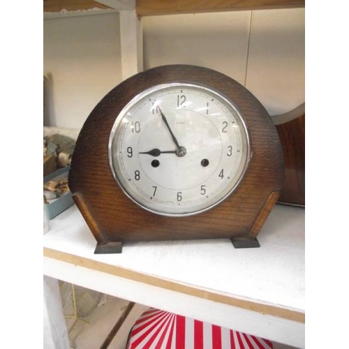 389 - Three 1930's oak mantle clocks (glass on 1 is loose)