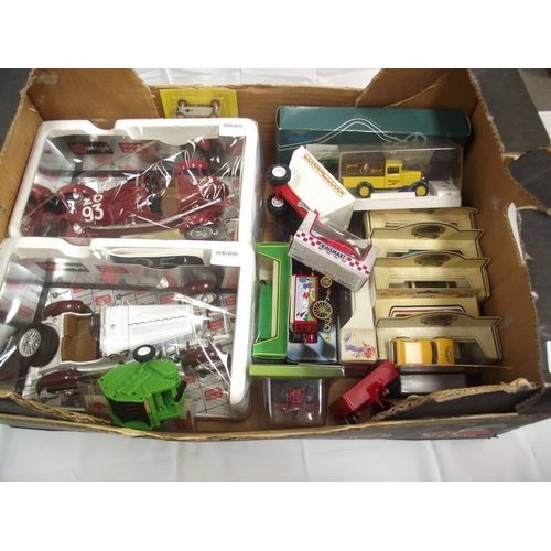 392 - A quantity of boxed diecast Including Lledo, Burago, Corgi etc.