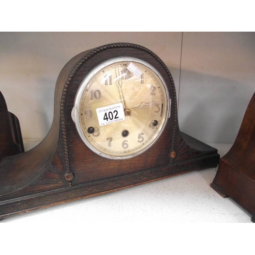 402 - Three 1930's oak mantle clocks