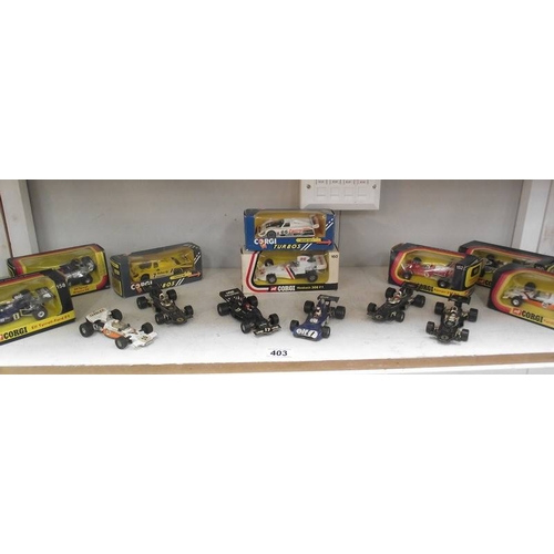 403 - A collection of Corgi Formula 1 racing cars, boxed and unboxed, 1970's onwards