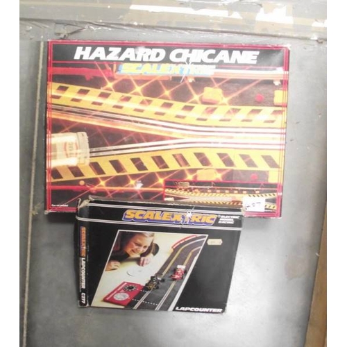 407 - A quantity of boxed Scalextric accessories including A/202 racing pit A/201 event board and hut, chi... 