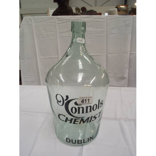 411 - A glass bottle jar with O'Connols chemist Dublin advertising lettering