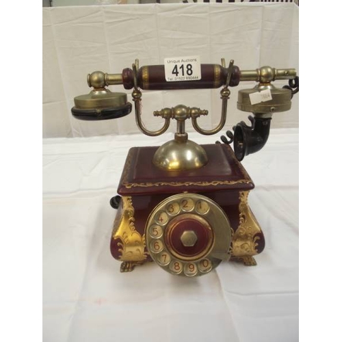 418 - A decorative vintage phone