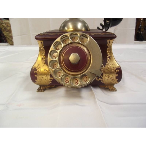 418 - A decorative vintage phone