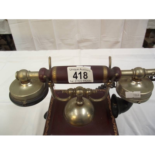 418 - A decorative vintage phone