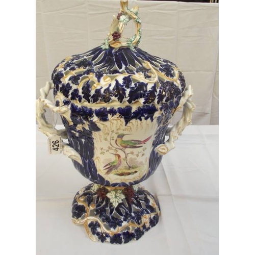 426 - A decorative lidded 2 handled vase, some minor age related marks etc.