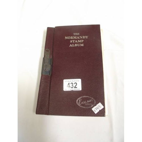 432 - A Normandy stamp album and contents