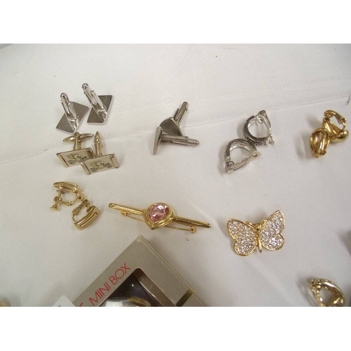 437 - A mixed lot of cuff links and clip on earrings etc.