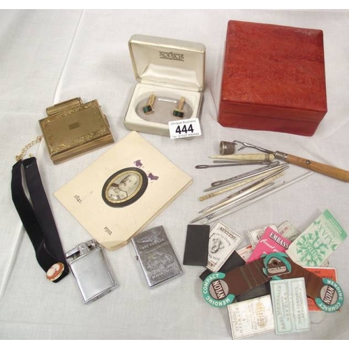 444 - A pair of malacite cufflinks, cigarette lighters, leather box, sewing implements etc.