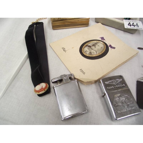 444 - A pair of malacite cufflinks, cigarette lighters, leather box, sewing implements etc.