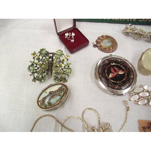 445 - A quantity of assorted earrings, rings, pill boxes etc.