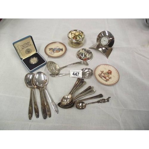 447 - A mixed lot including s/p spoons, Hummel plates, Hummel picture paperweight, German music box, silve... 