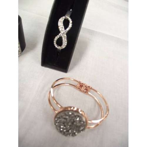 452 - 4 diamonte bangles