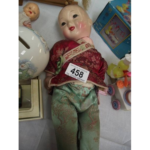 458 - A Japanese doll and other toys