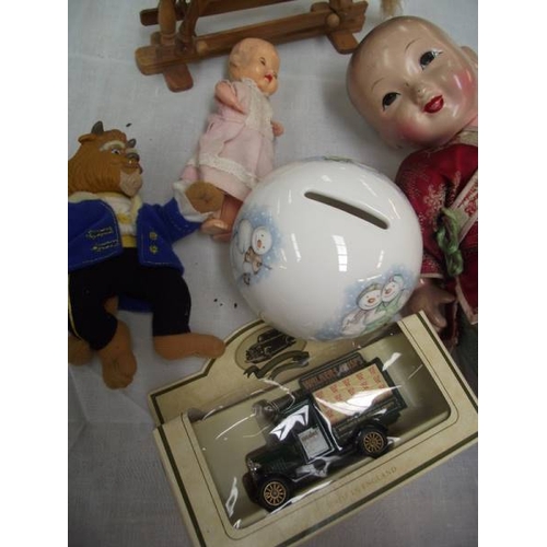 458 - A Japanese doll and other toys