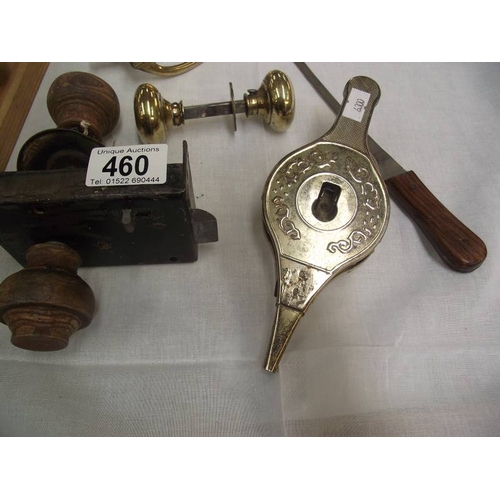 460 - A quantity of door knobs, door knocker etc.