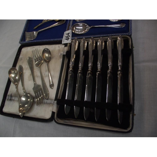 464 - A cased set of 6 silver handled knives, a cased set of 6 silver plate spoons and other cutlery