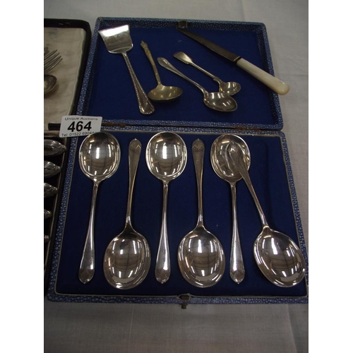 464 - A cased set of 6 silver handled knives, a cased set of 6 silver plate spoons and other cutlery