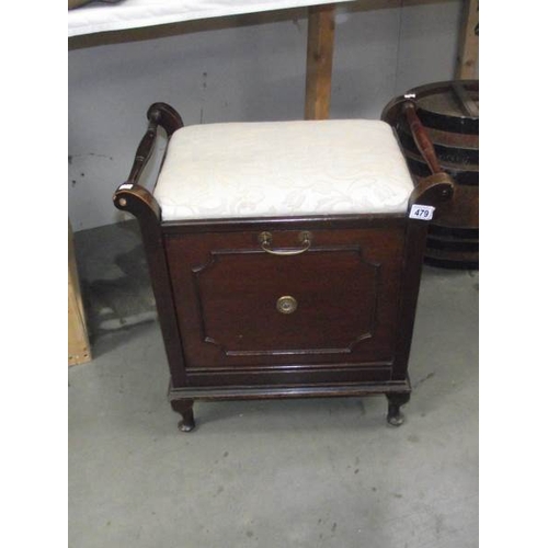 479 - An Edwardian piano stool with music rack