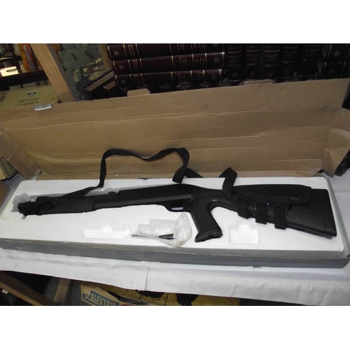 493 - A boxed Airsoft M56A Multi-Shot shotgun - Hop Up Version