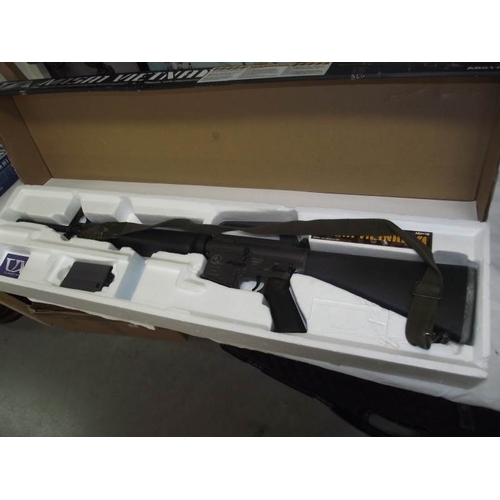 502 - A boxed Airsoft Vietnam M15A1 rifle and a boxed BIM302 3 in 1 Long