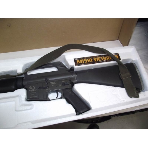 502 - A boxed Airsoft Vietnam M15A1 rifle and a boxed BIM302 3 in 1 Long