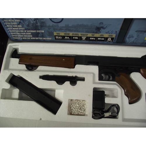 505 - A boxed Airsoft Thompson M1A1 military gun