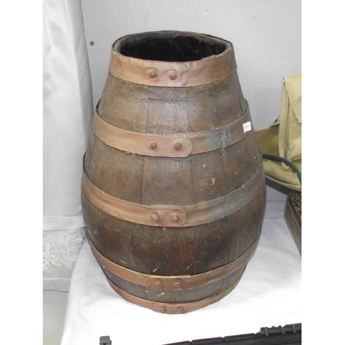 511 - A large copper and wood barrel / jug