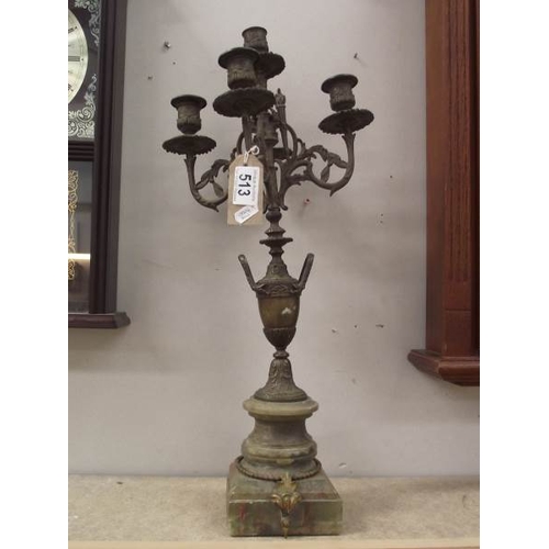 513 - A bronze 4 arm candelabra