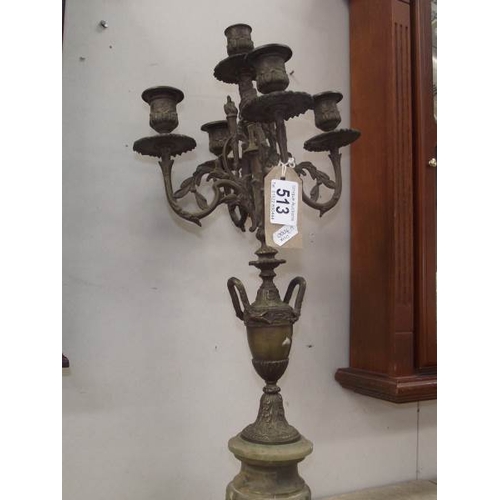 513 - A bronze 4 arm candelabra