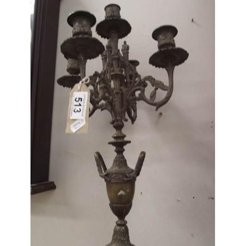 513 - A bronze 4 arm candelabra