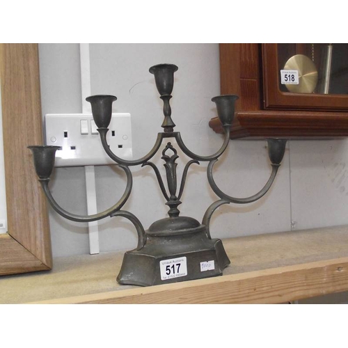 517 - A white metal 5 arm candelabra.