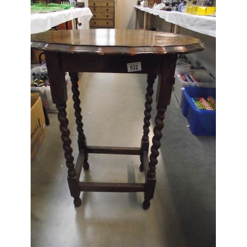 532 - A 1930's oak side table.