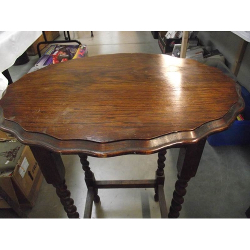 532 - A 1930's oak side table.