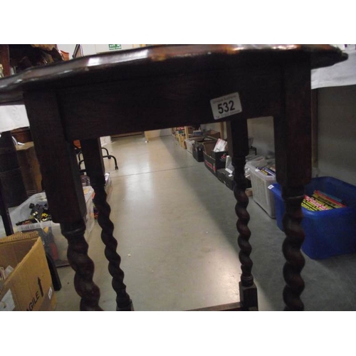 532 - A 1930's oak side table.