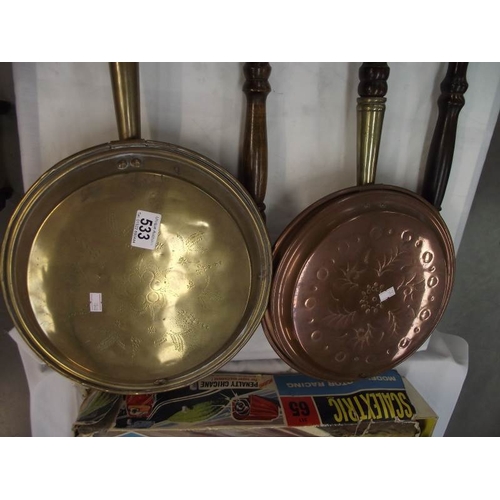 533 - 4 Victorian copper and brass bed warming pans.