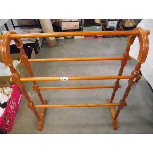 535 - A solid pine towel rail.