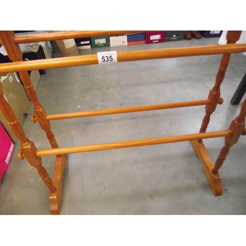 535 - A solid pine towel rail.