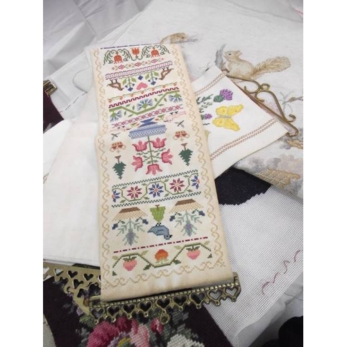 538 - A selection of tapestry wall hangings, samplers etc.,