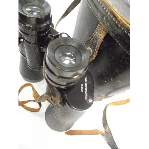 539 - Halina 16 x 50 binoculars with case.