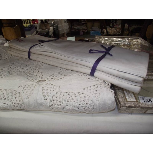 556 - An Irish rose design crochet bedcover with two old bleached hand painted Damask table cloths, made i... 