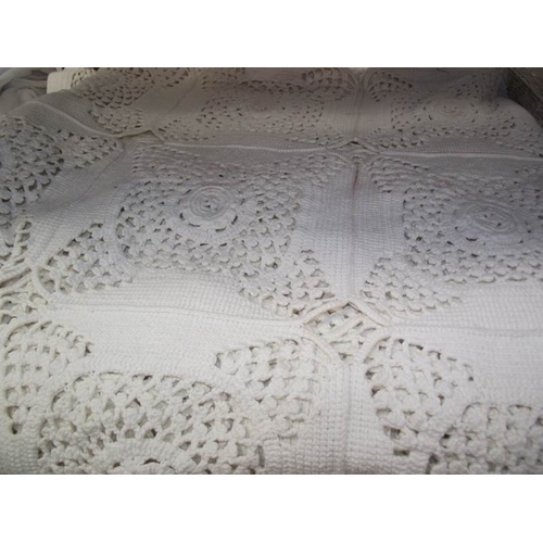 556 - An Irish rose design crochet bedcover with two old bleached hand painted Damask table cloths, made i... 