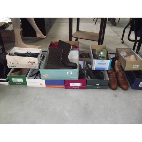 557 - A quantity of new and used shoes.