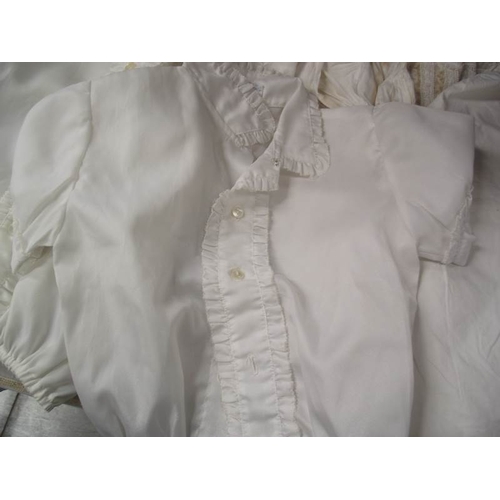 559 - 4 early 20th century Christening dresses with lace embroidery plus dolls clothes etc.,